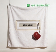 Miumiu Throw Blankets